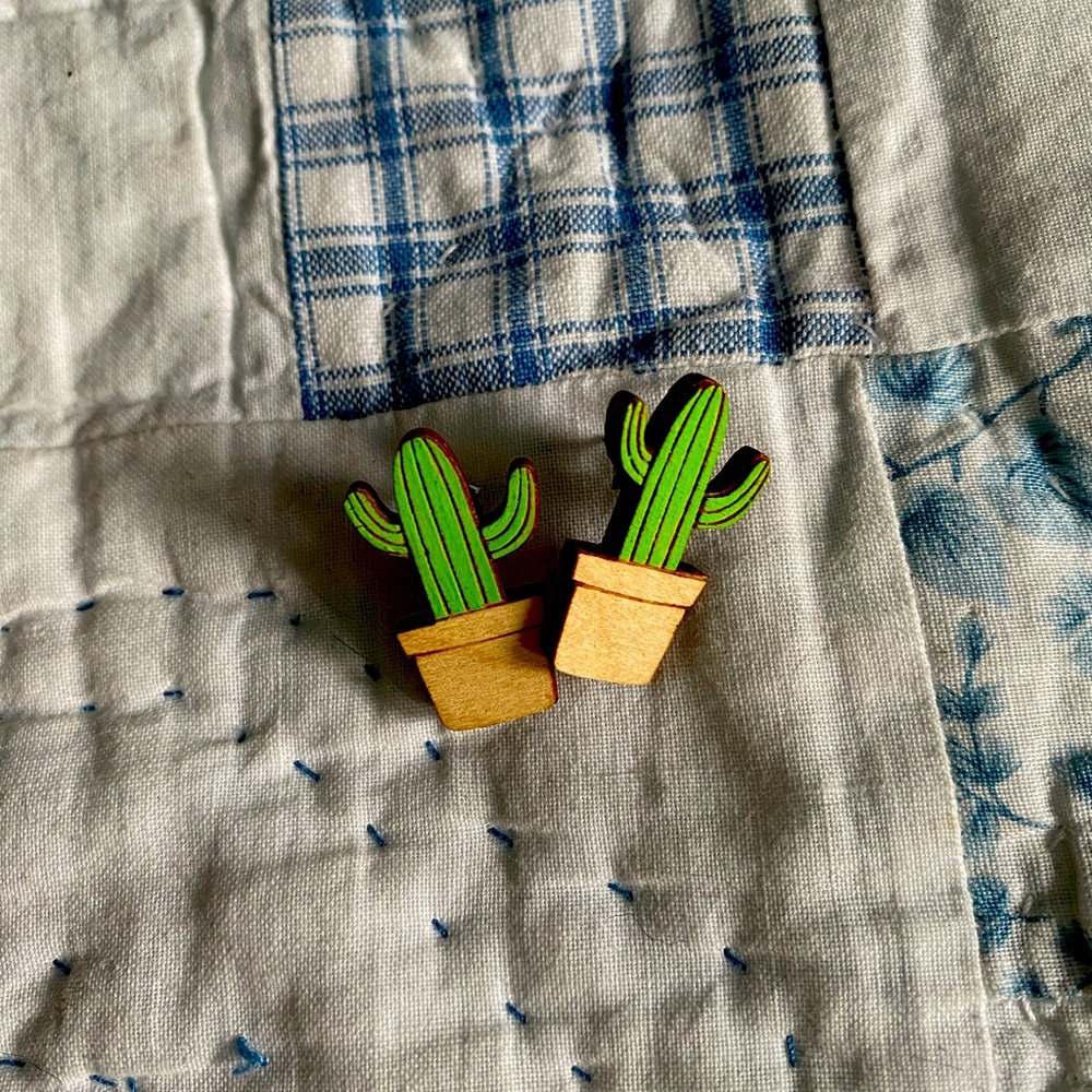 Cute artisan made cactus earrings.